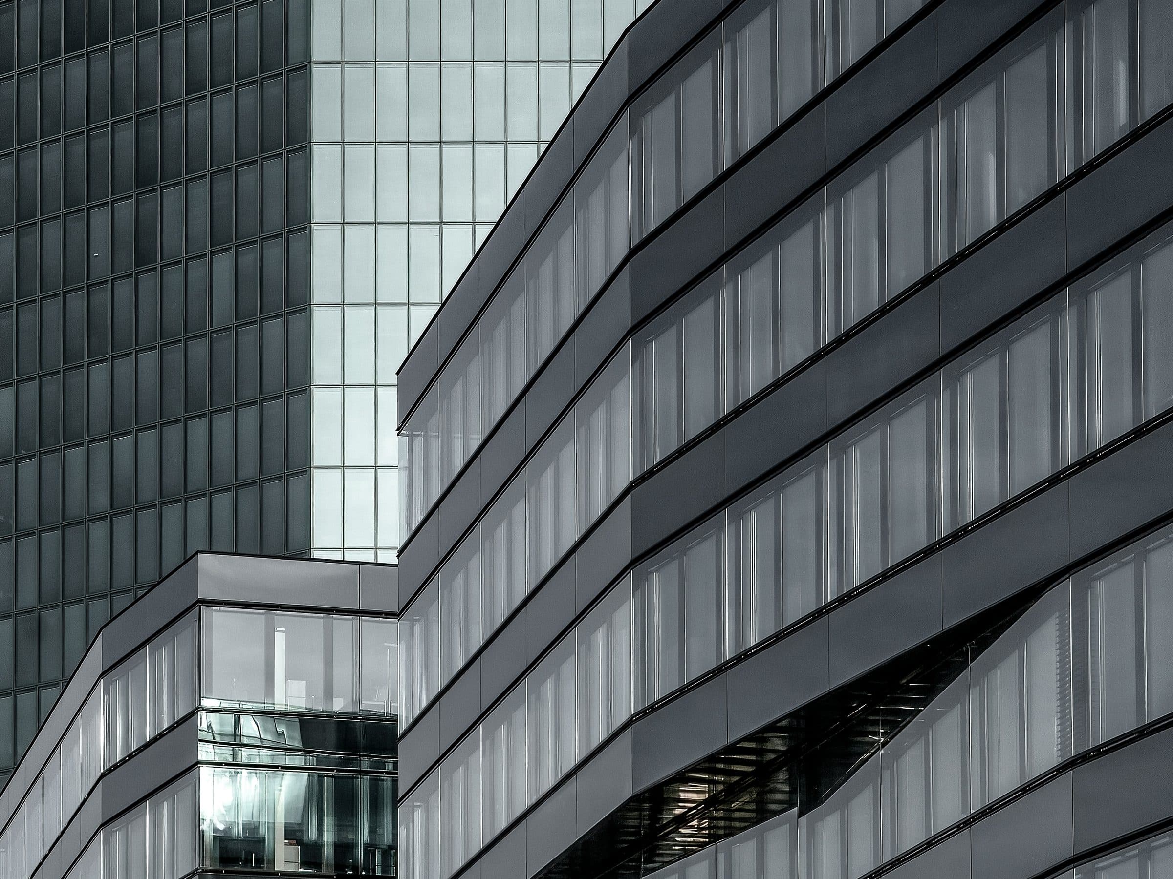 Grey glass façades in long horizontal bands